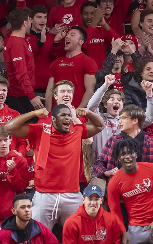 Image of students supporting their peers at a Marist basketball game.